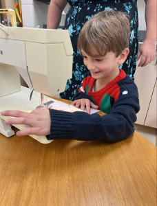 Student using a sewing machine